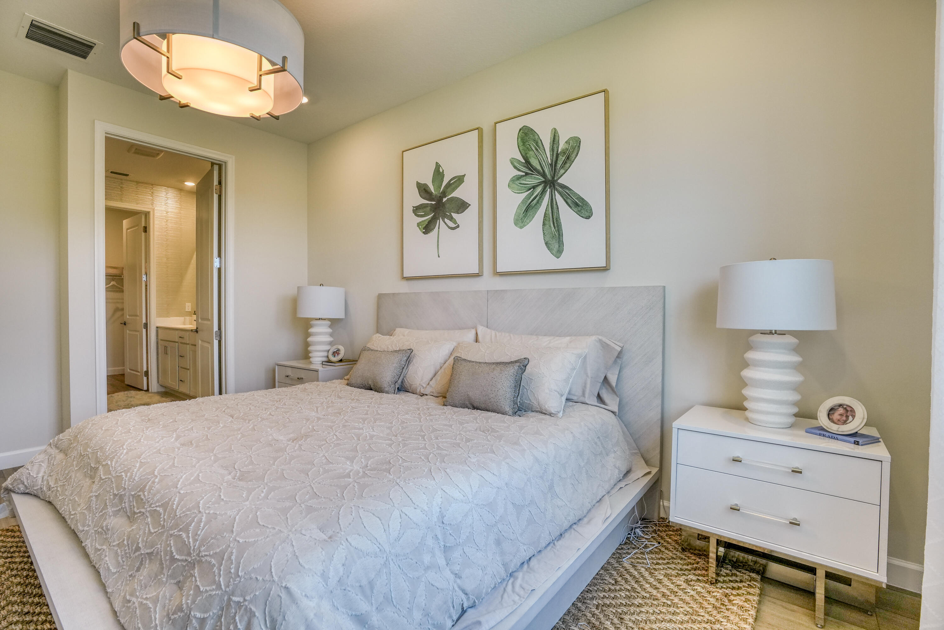 13776 Hero Path Delray Beach, FL 33484 - Photo 7 of 13 a bedroom with a bed and a painting on the wall