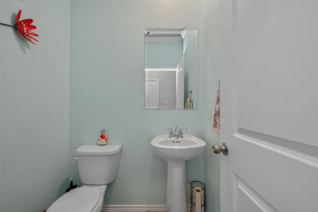 a bathroom with a sink and a toilet