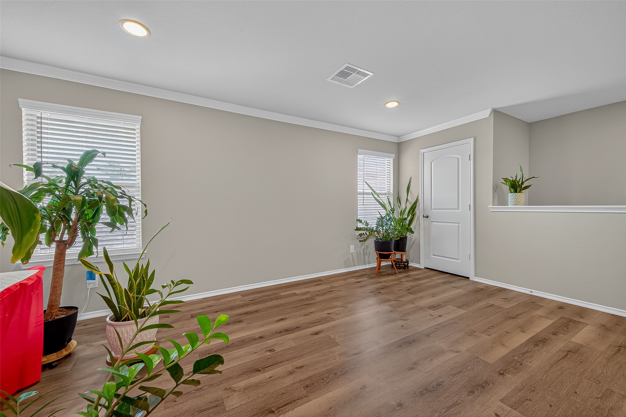 9253 Inland Leather Lane Conroe, TX 77385 - Photo 19 of 34 a view of an empty room with a window