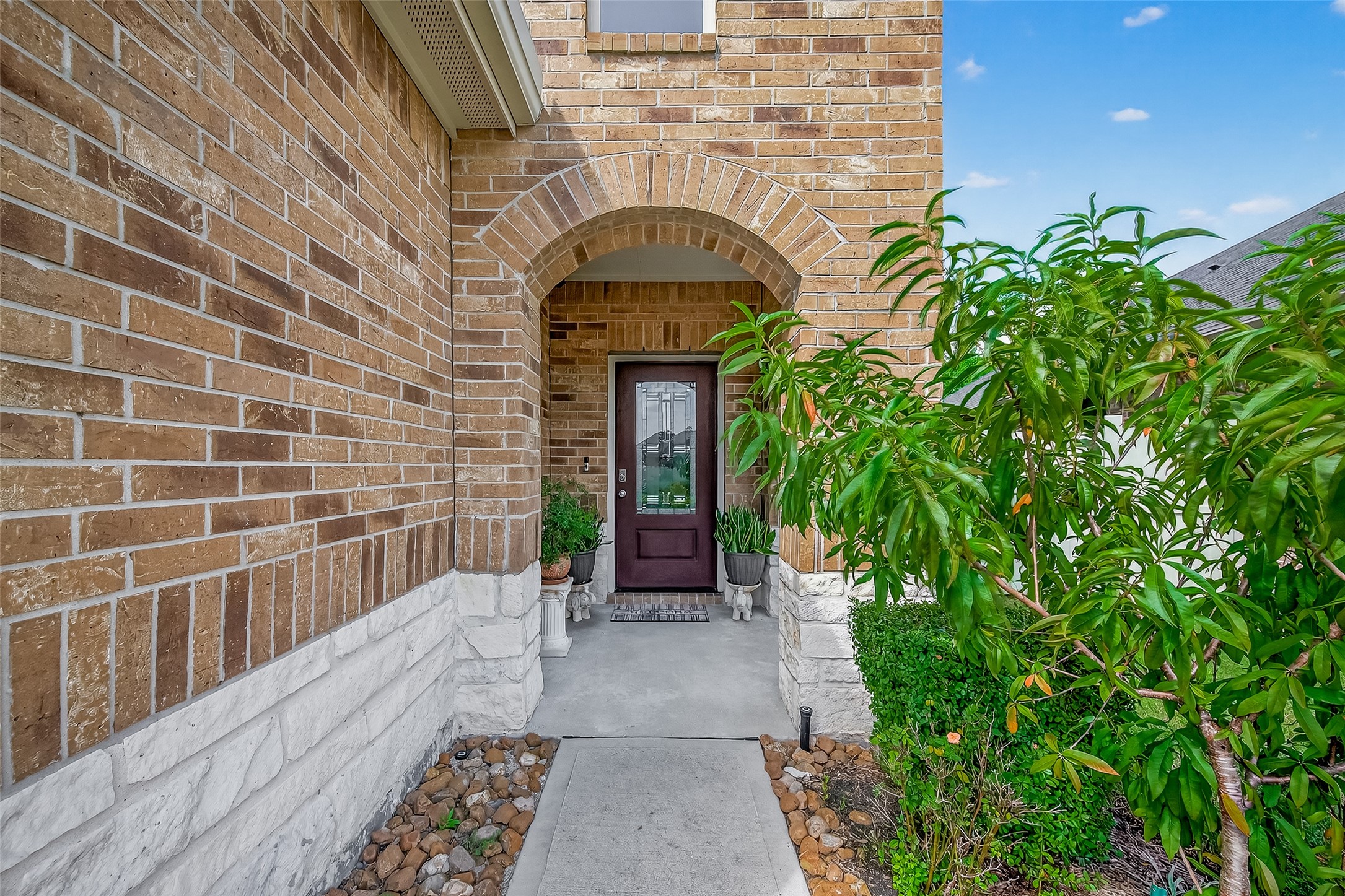 9253 Inland Leather Lane Conroe, TX 77385 - Photo 2 of 34 a building with a outdoor space