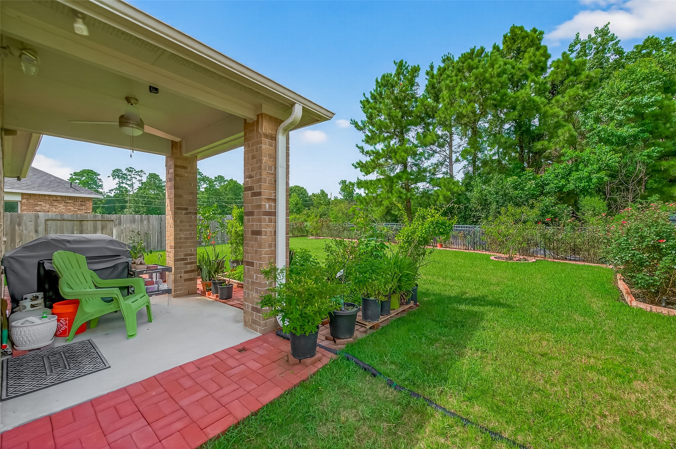 9253 Inland Leather Lane Conroe, TX 77385 - Photo 27 of 34 a view of yard with green space