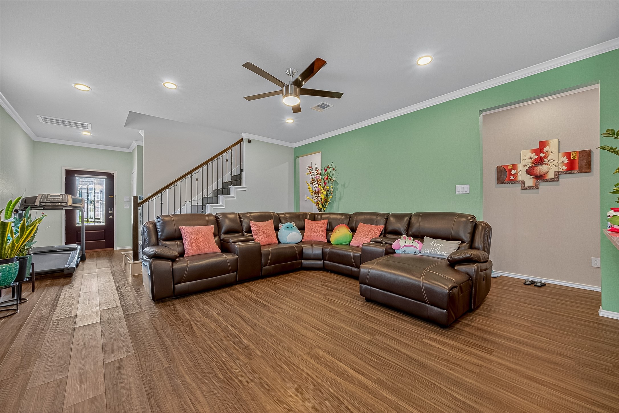 9253 Inland Leather Lane Conroe, TX 77385 - Photo 4 of 34 a living room with furniture and wooden floor