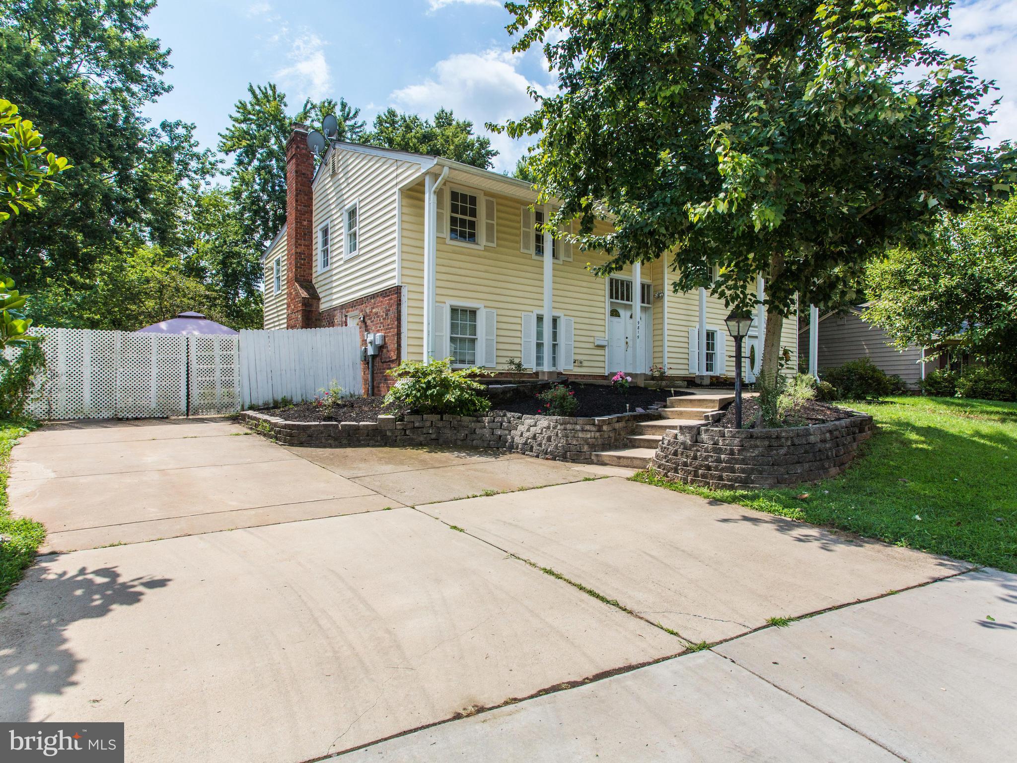 9819 Greenview Lane Manassas, VA 20109 - Photo 1 of 30 Front of home viewed from the end of the driveway