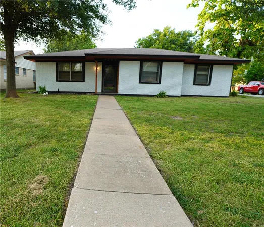 a front view of house with yard