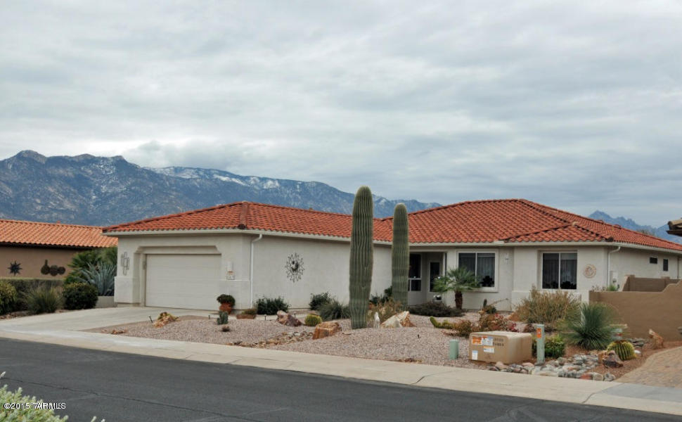 62419 East Northwood Road Tucson, AZ 85739 - Photo 28 of 30 a front view of a house with a sitting area
