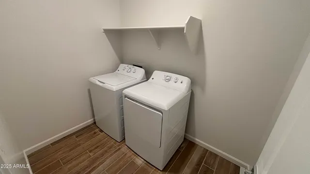 a utility room with dryer and washer