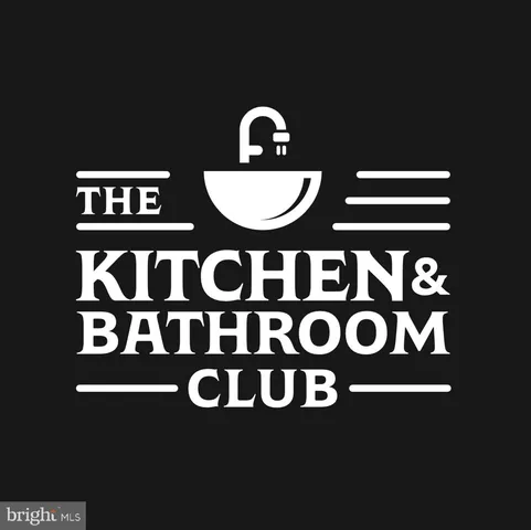 a kitchen with stainless steel appliances kitchen island granite countertop a sink and cabinets