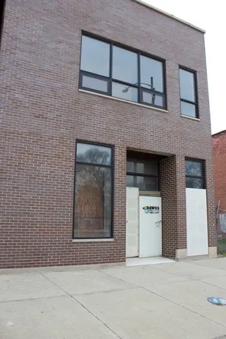 a front view of a house with a garage