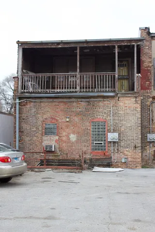 a front view of a house with parking
