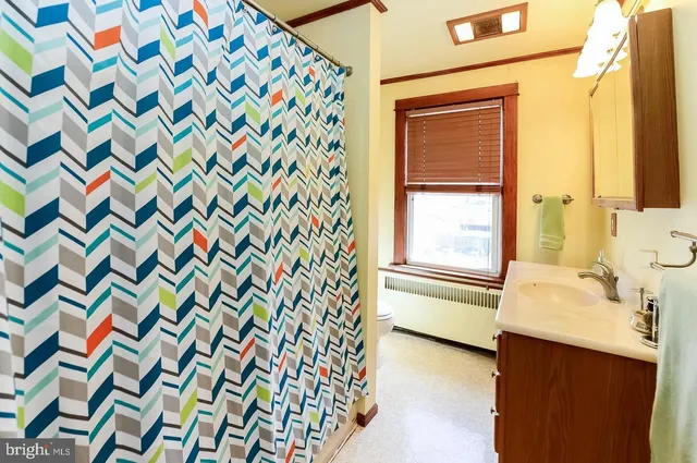 a bathroom with a sink and a bathtub
