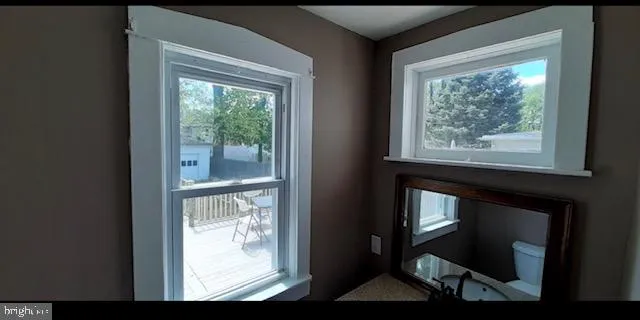 a view of a room that has a window in it