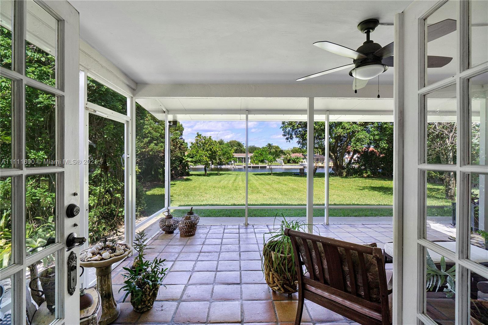 183 Oregon Lane Boca Raton, FL 33487 - Photo 13 of 25 a view of a porch and garden