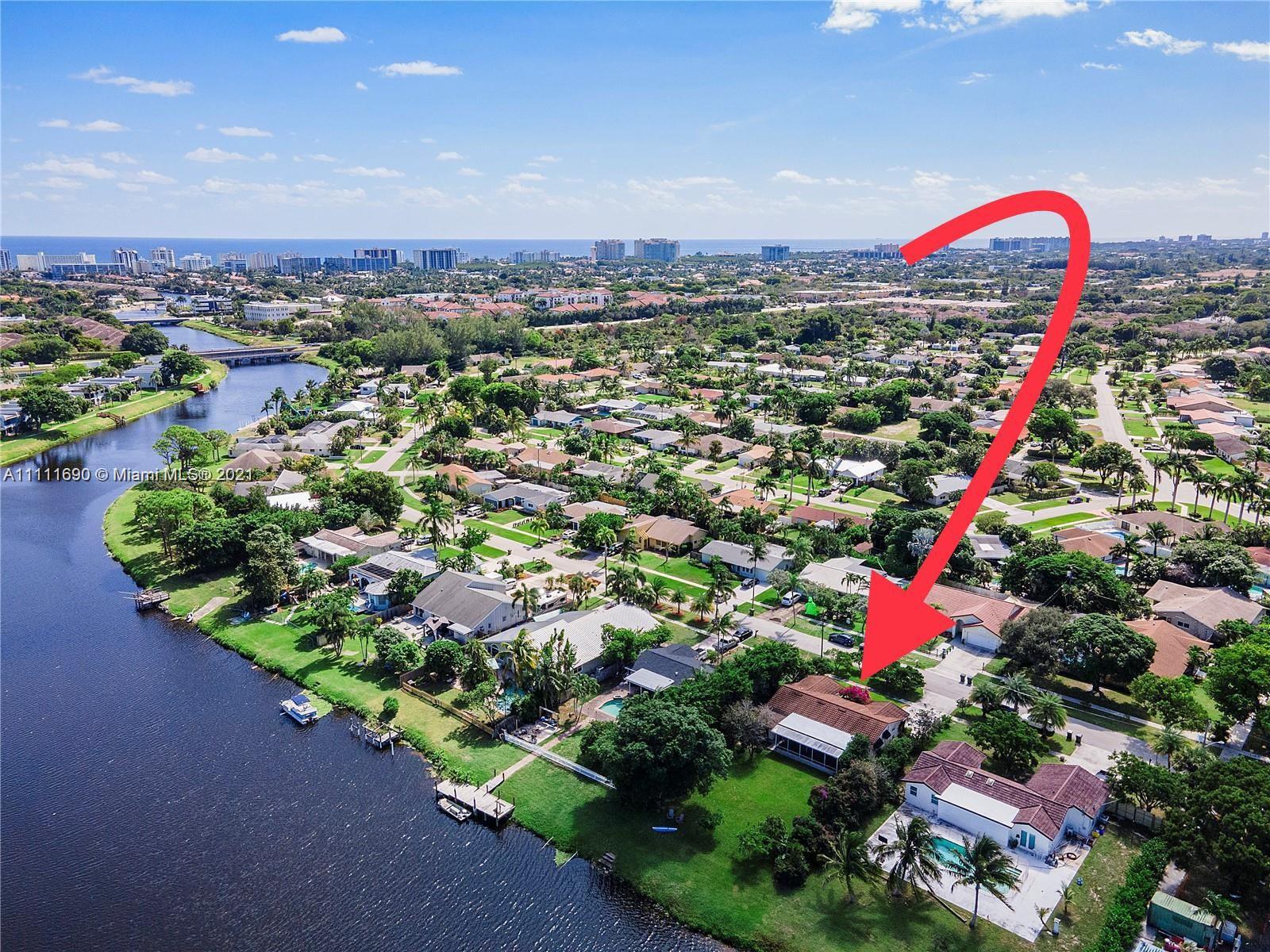 183 Oregon Lane Boca Raton, FL 33487 - Photo 23 of 25 an aerial view of residential houses with outdoor space and swimming pool