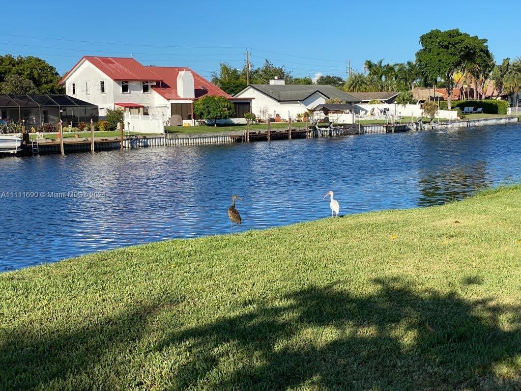 183 Oregon Lane Boca Raton, FL 33487 - Photo 25 of 25 a view of a lake with houses