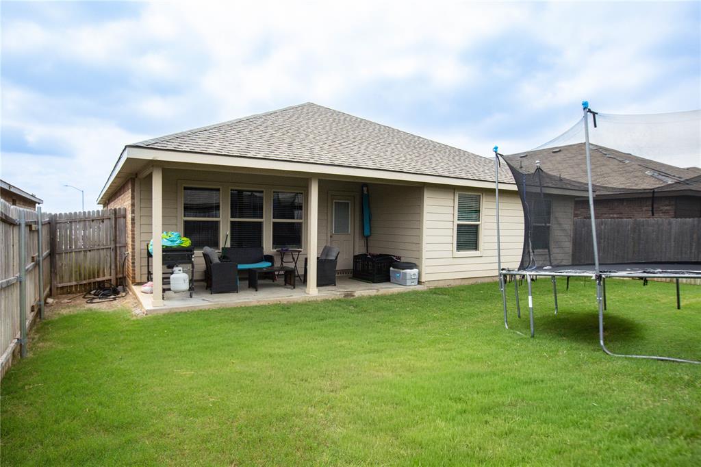 3204 Quiet Valley Road Fort Worth, TX 76123 - Photo 28 of 29 a view of a house with a yard and sitting area