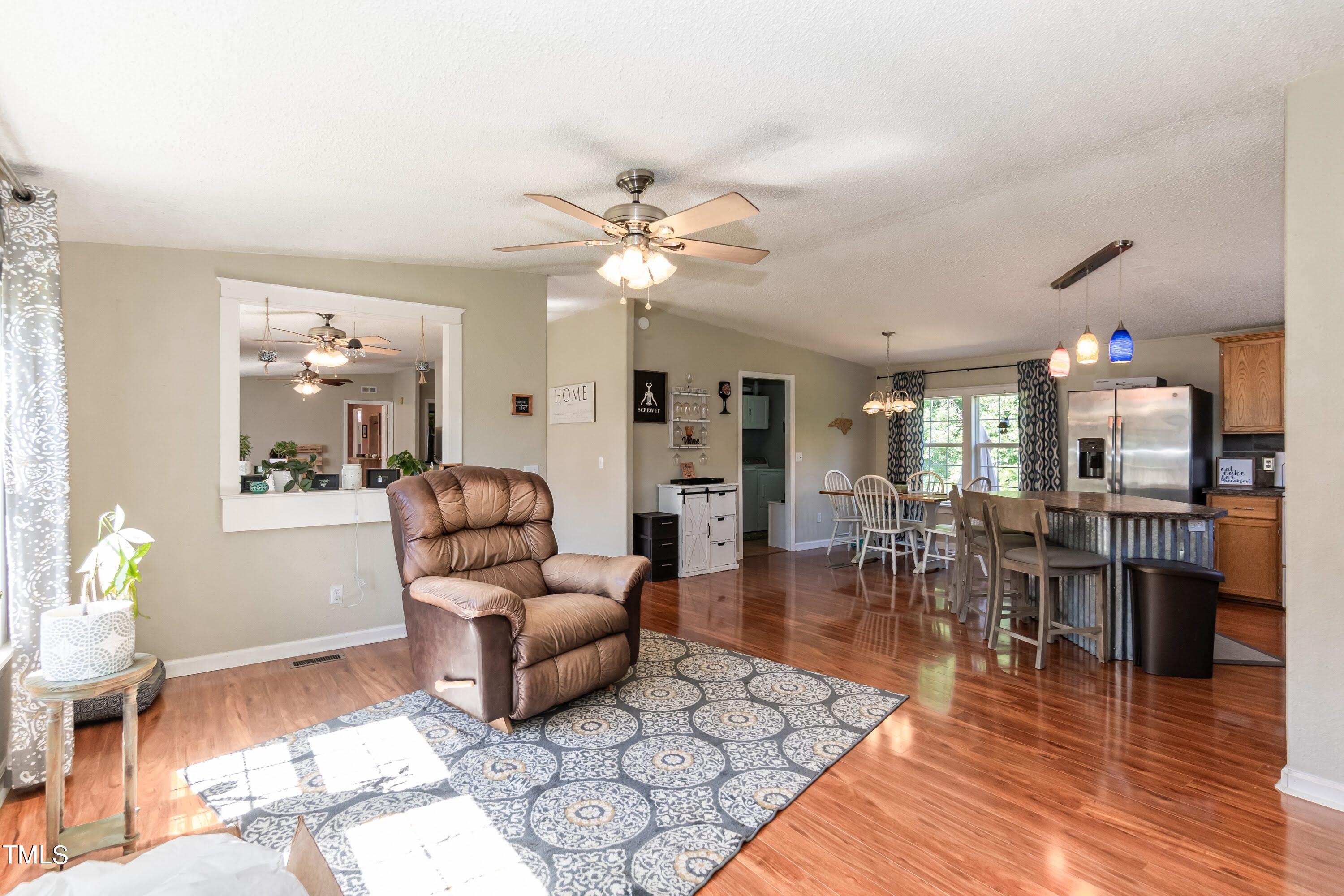 552 Locks Lane Rougemont, NC 27572 - Photo 11 of 45 a living room with furniture and wooden floor