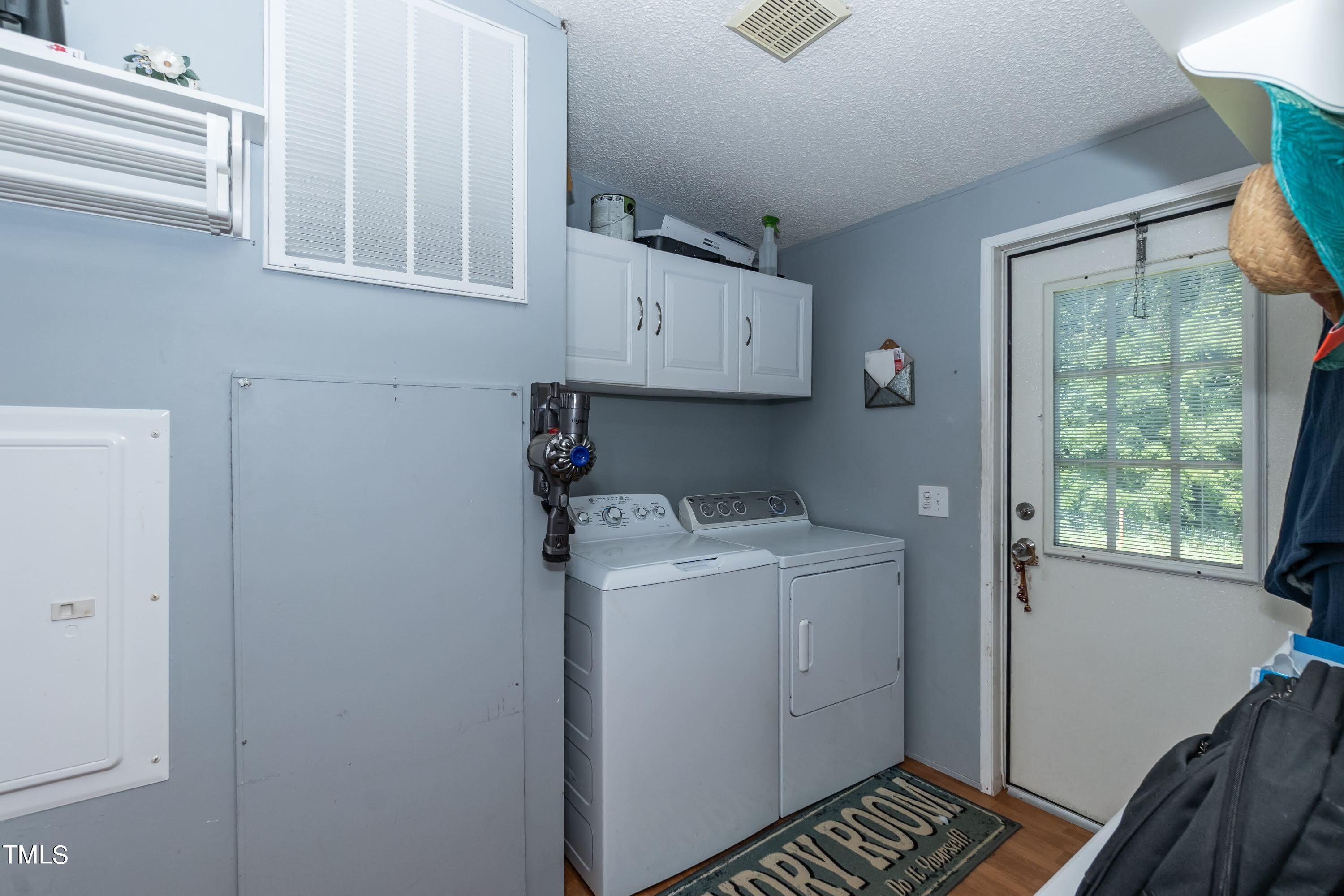 552 Locks Lane Rougemont, NC 27572 - Photo 31 of 45 a utility room with dryer and washer