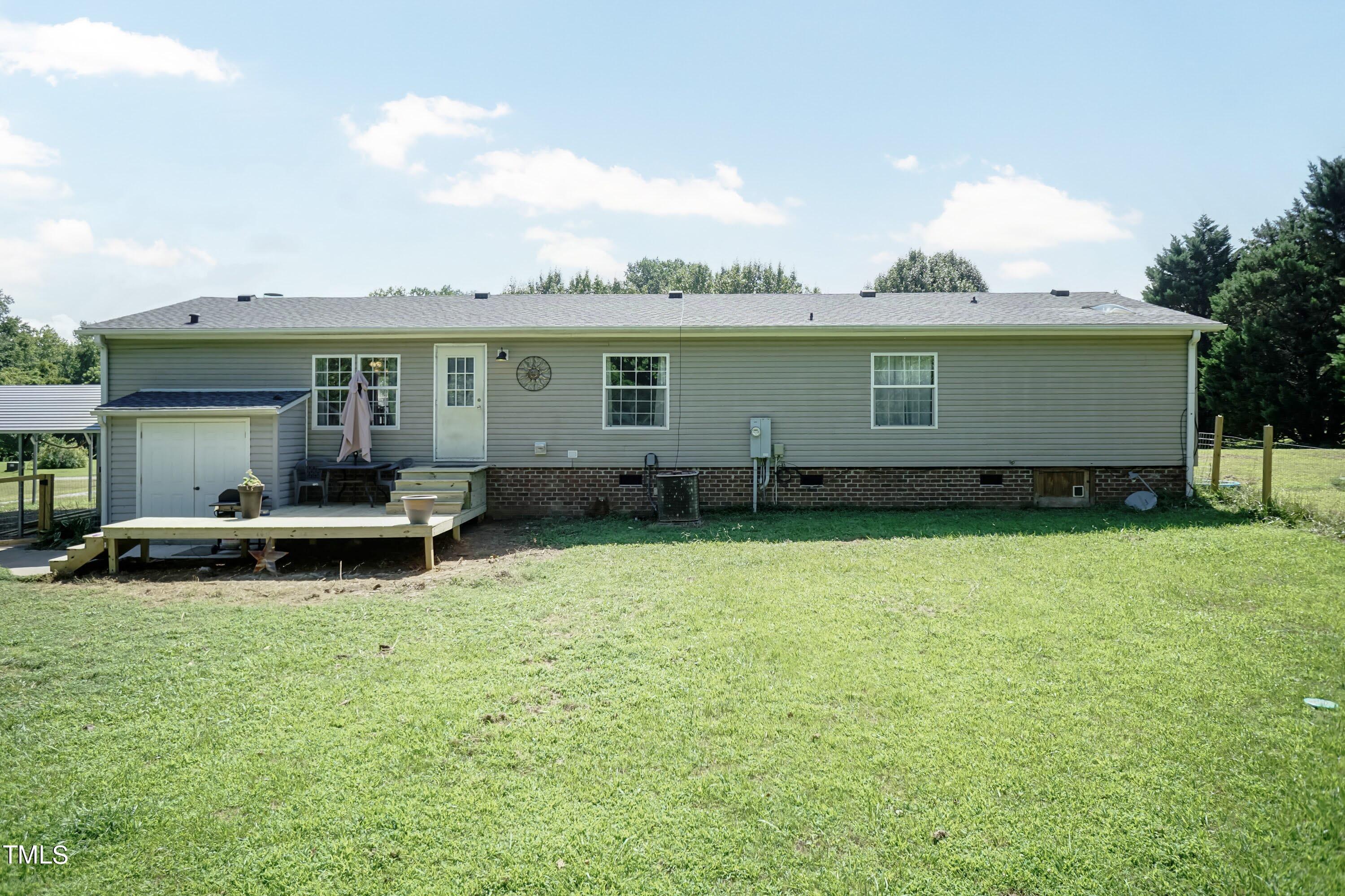 552 Locks Lane Rougemont, NC 27572 - Photo 36 of 45 a view of a backyard with a garden and plants