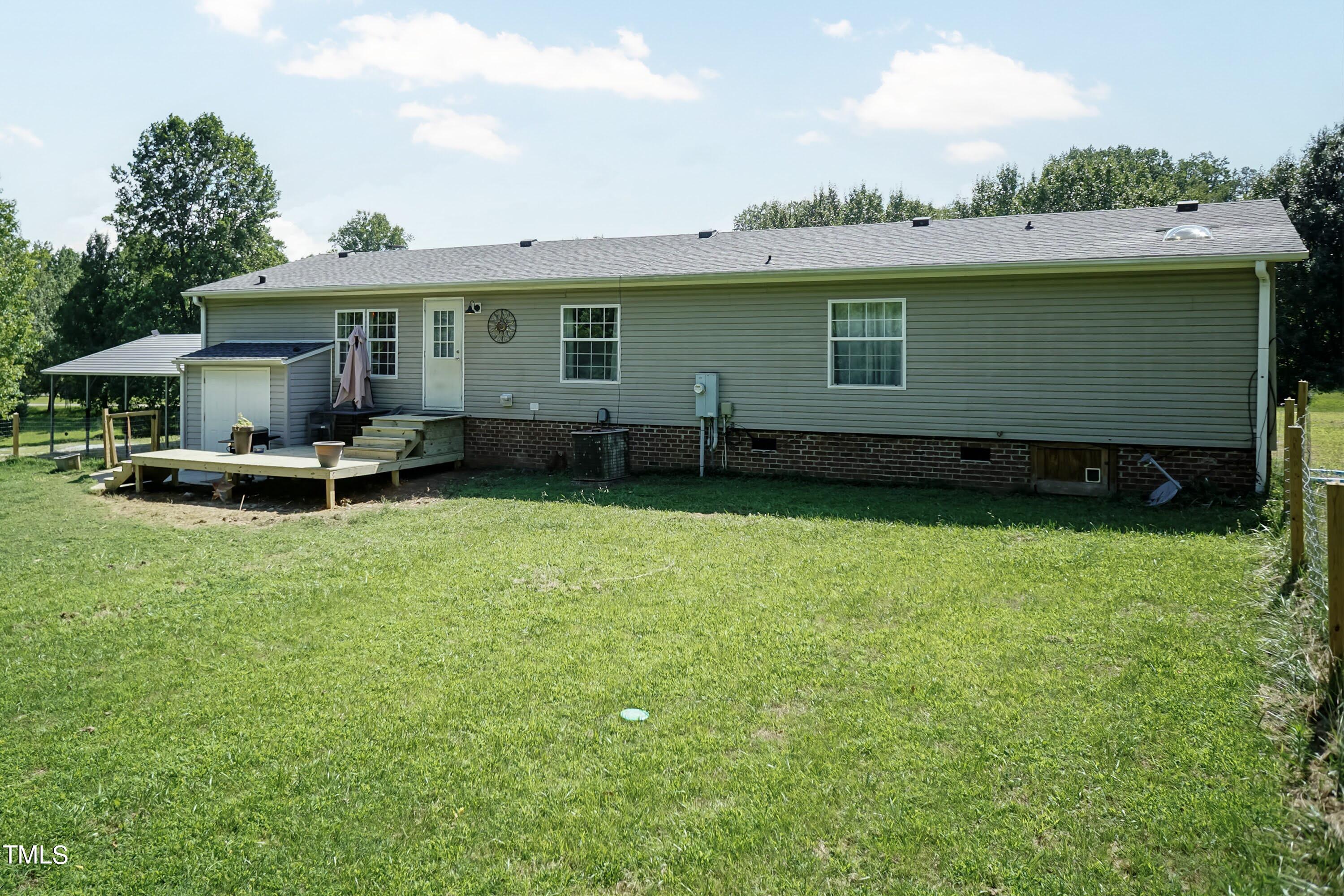 552 Locks Lane Rougemont, NC 27572 - Photo 37 of 45 a view of a house with a backyard
