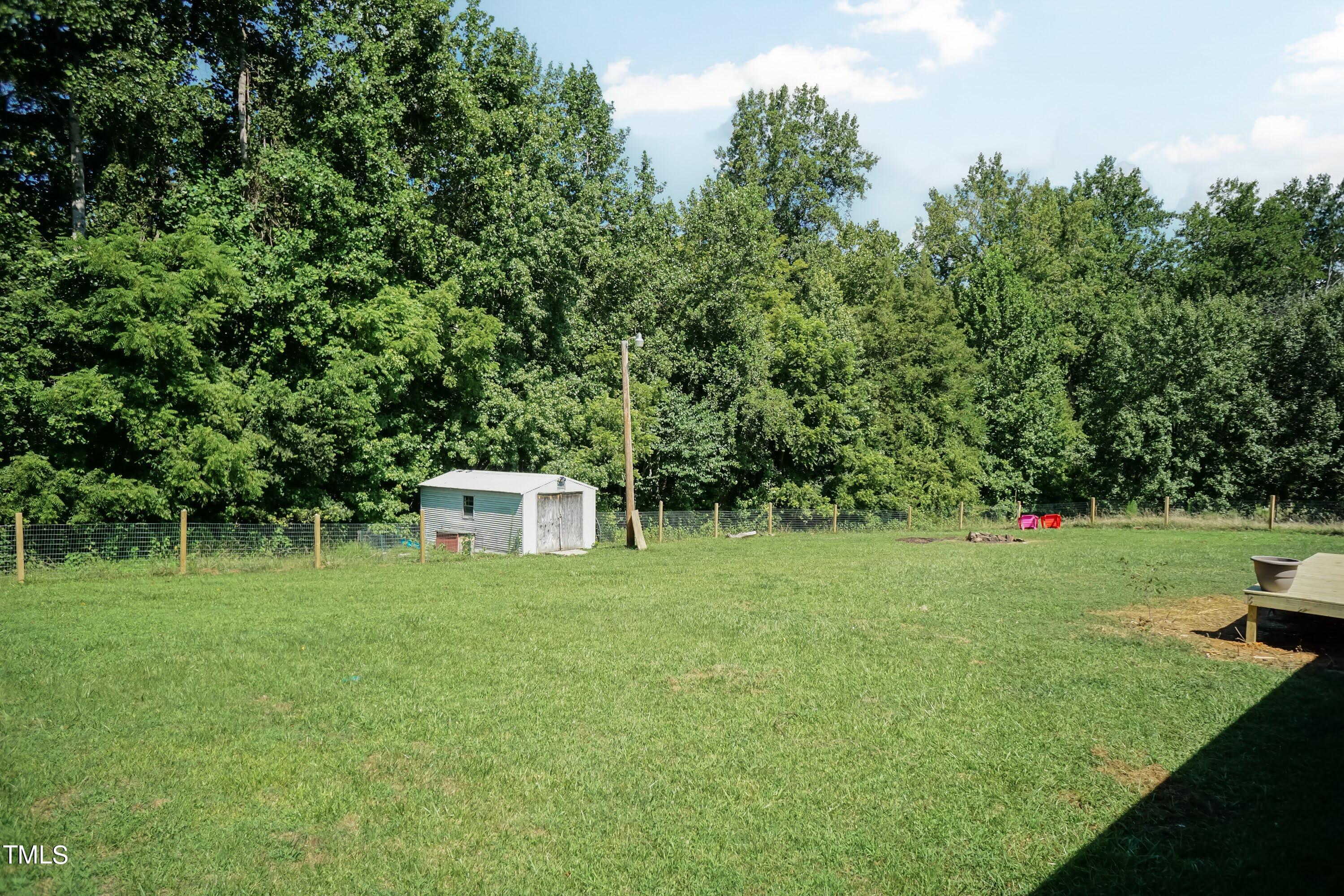 552 Locks Lane Rougemont, NC 27572 - Photo 41 of 45 a house view with a backyard space
