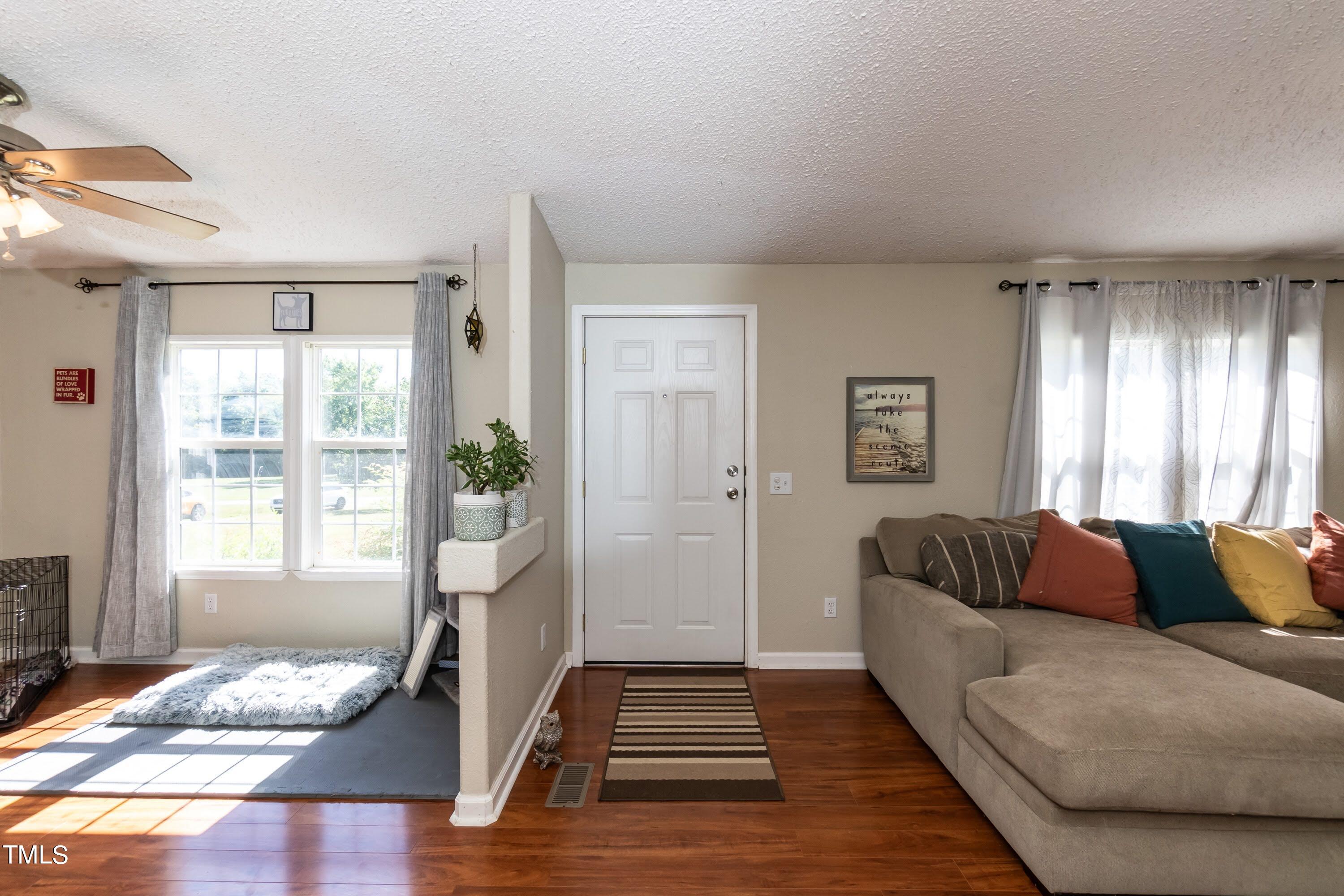 552 Locks Lane Rougemont, NC 27572 - Photo 8 of 45 a living room with furniture and a window