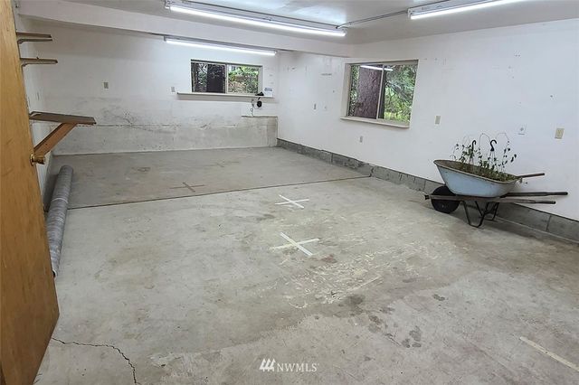 a view of a livingroom with furniture and window