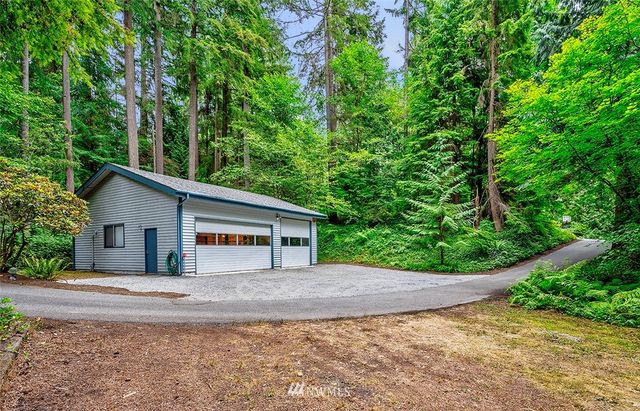 front view of a house with a small yard