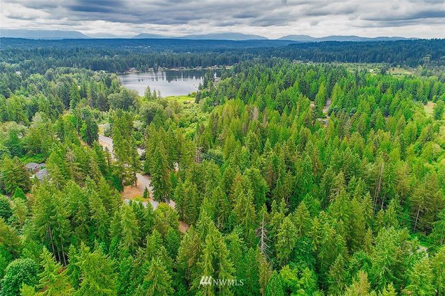 a view of a lake from a yard