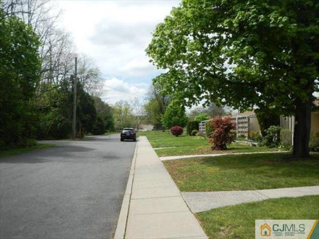 20 New Road, Unit 7A Kendall Park, NJ 08824 - Photo 4 of 4 a view of a park with large trees
