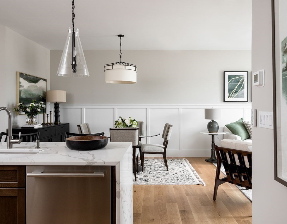 50 Coppersmith Way, Unit 107 Canton, MA 02021 - Photo 15 of 42 a view of a dining room with furniture and wooden floor