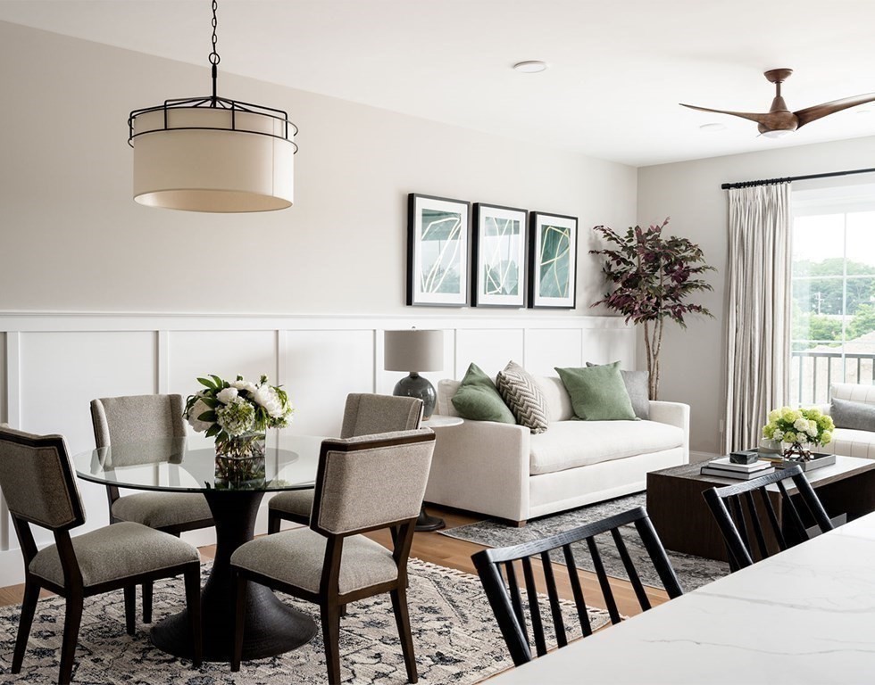 50 Coppersmith Way, Unit 107 Canton, MA 02021 - Photo 18 of 42 a living room with furniture and a window