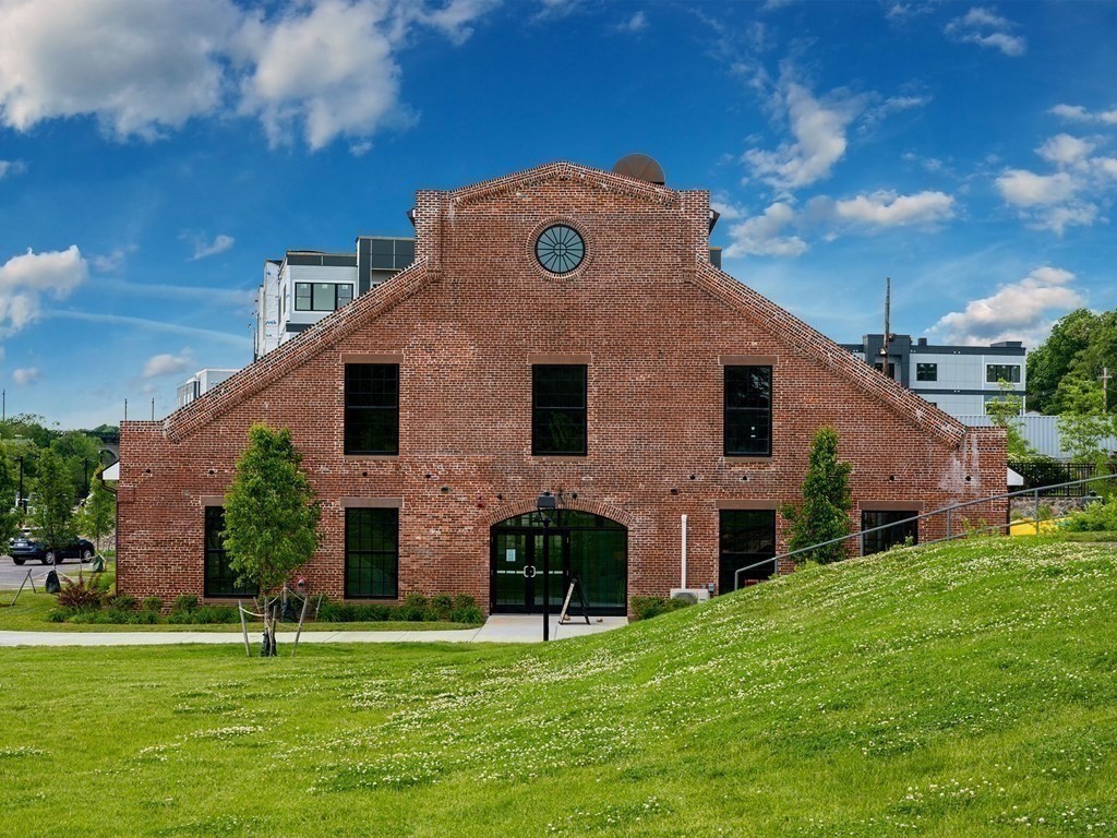 50 Coppersmith Way, Unit 107 Canton, MA 02021 - Photo 33 of 42 a front view of house with yard