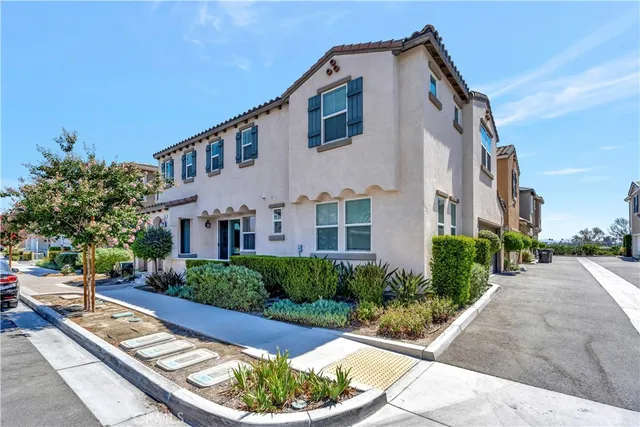 a view of multiple house with a yard