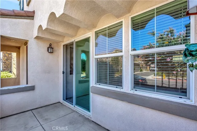 a view of a house with a large window