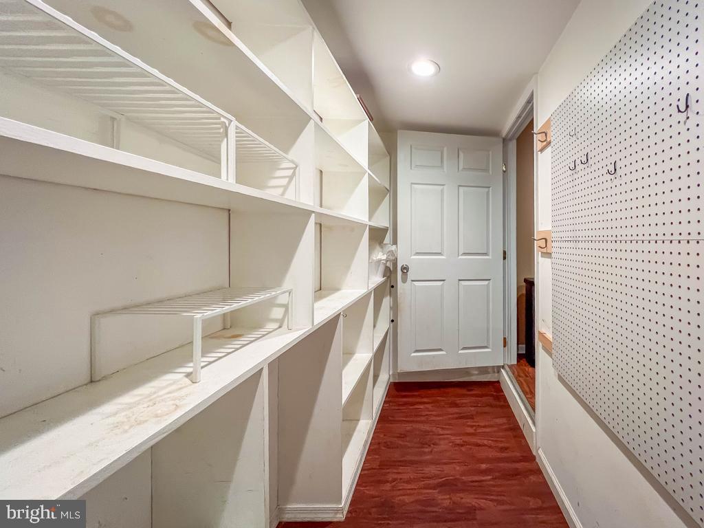 599 Panther Road Warminster, PA 18974 - Photo 17 of 57 a view of a hallway with wooden floor and staircase