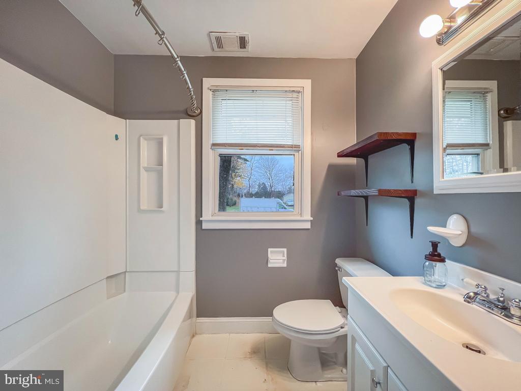 599 Panther Road Warminster, PA 18974 - Photo 18 of 57 a bathroom with a sink toilet and shower
