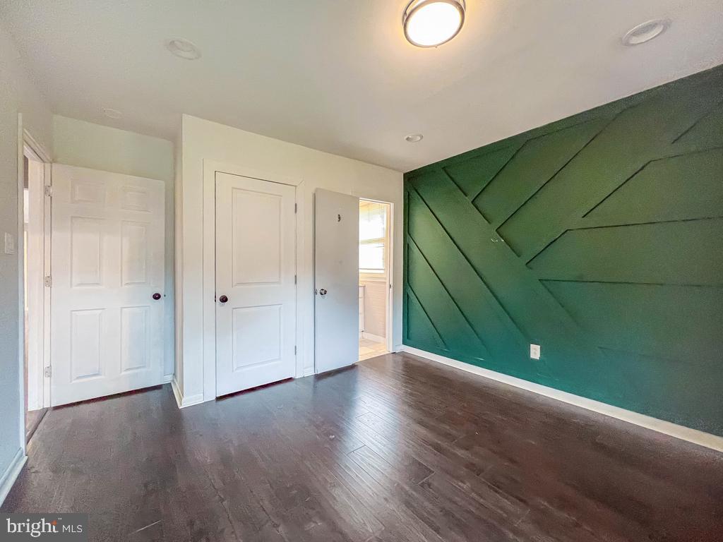 599 Panther Road Warminster, PA 18974 - Photo 21 of 57 a view of an empty room with wooden floor
