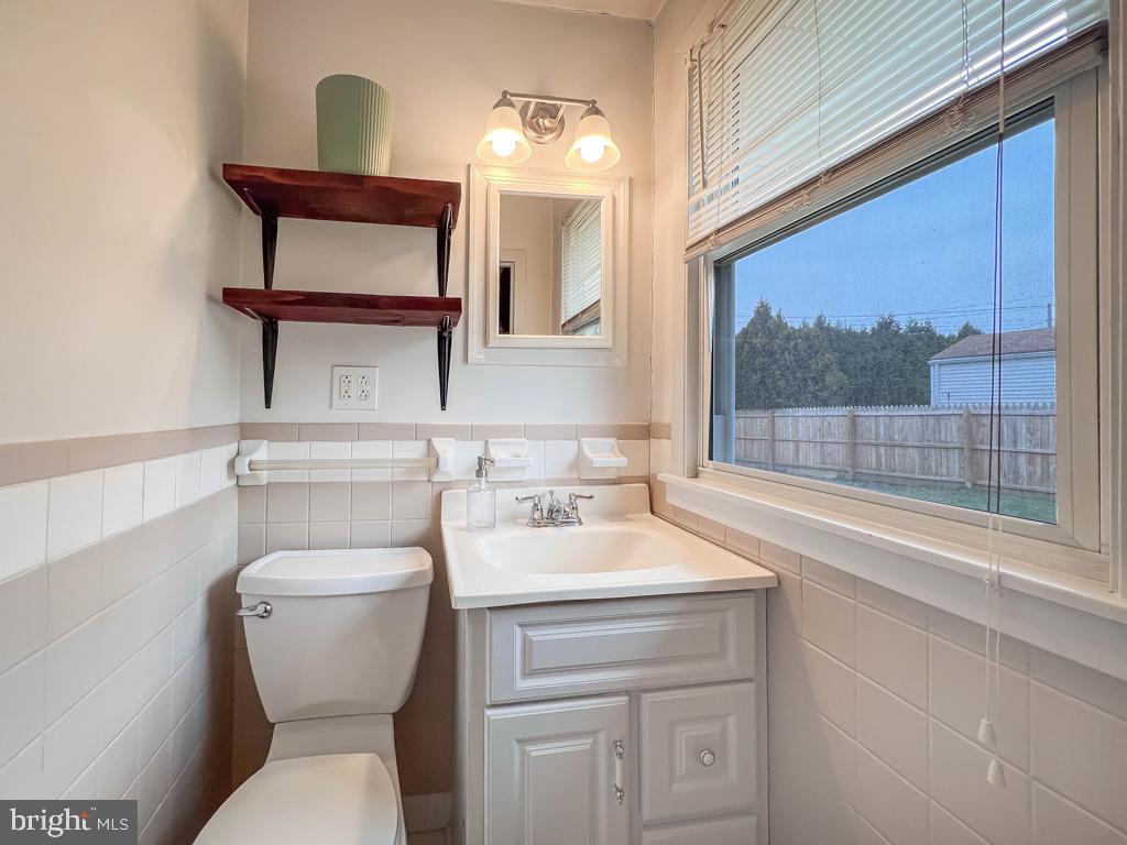 599 Panther Road Warminster, PA 18974 - Photo 24 of 57 a bathroom with a toilet a sink and a mirror