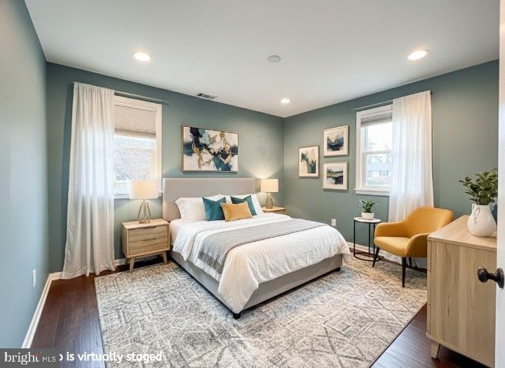 599 Panther Road Warminster, PA 18974 - Photo 26 of 57 a bedroom with a bed a table and painting on the wall