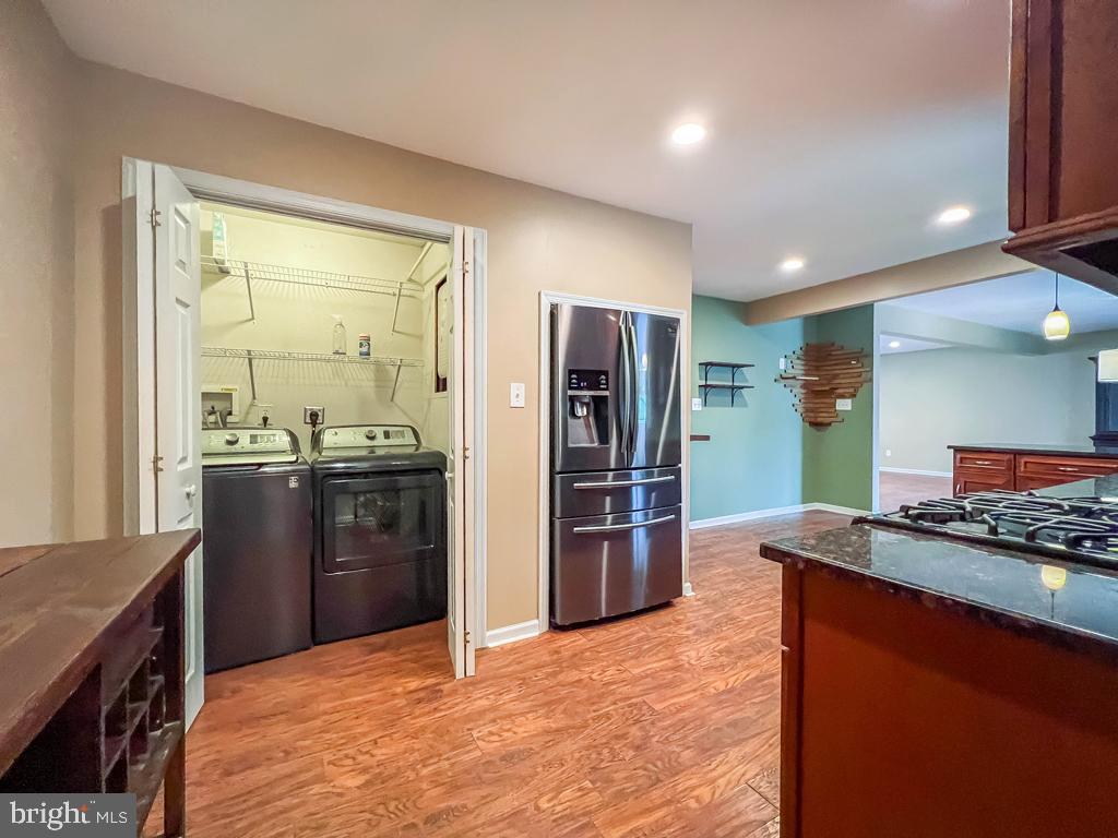 599 Panther Road Warminster, PA 18974 - Photo 36 of 57 a kitchen with stainless steel appliances granite countertop a refrigerator a stove and a sink