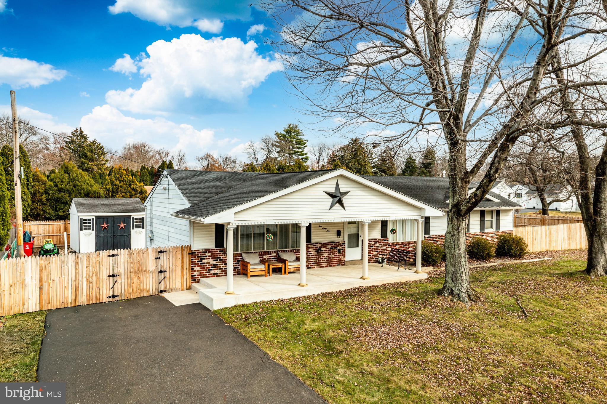 599 Panther Road Warminster, PA 18974 - Photo 38 of 57 a front view of a house with a yard
