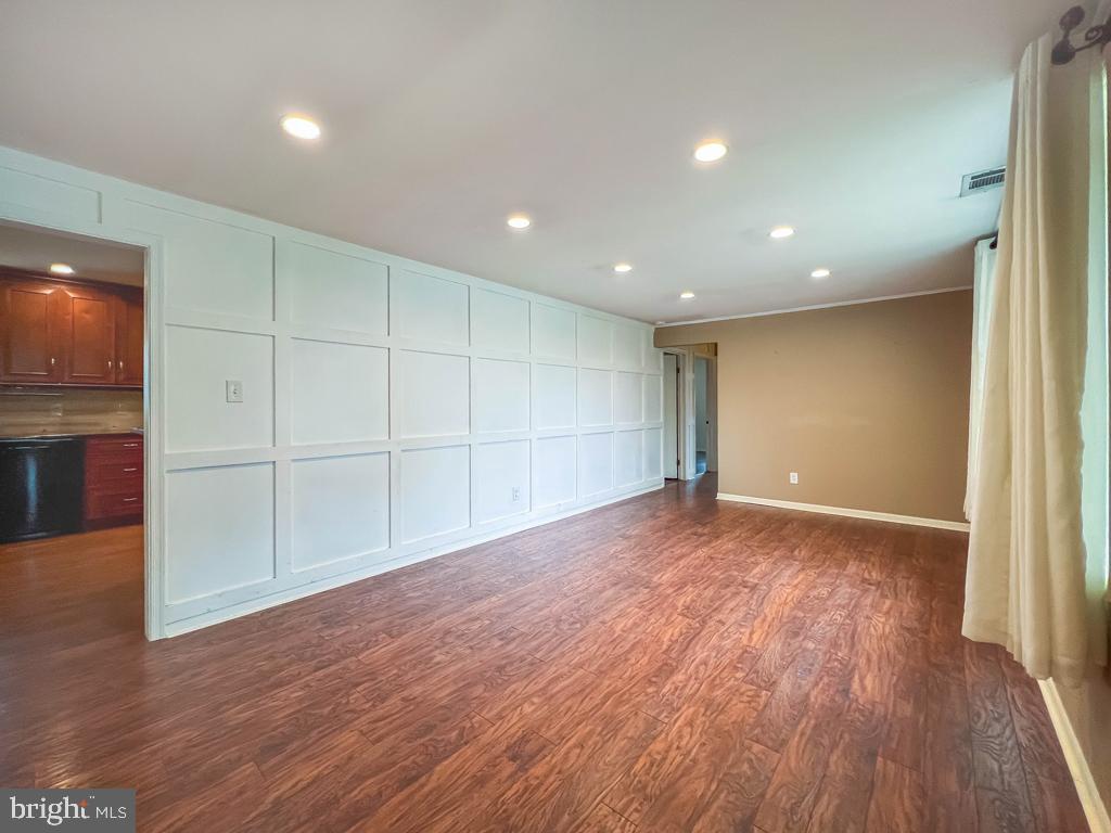 599 Panther Road Warminster, PA 18974 - Photo 9 of 57 a view of empty room with wooden floor