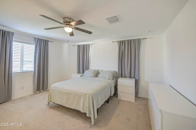 a view of a livingroom with a flat screen tv