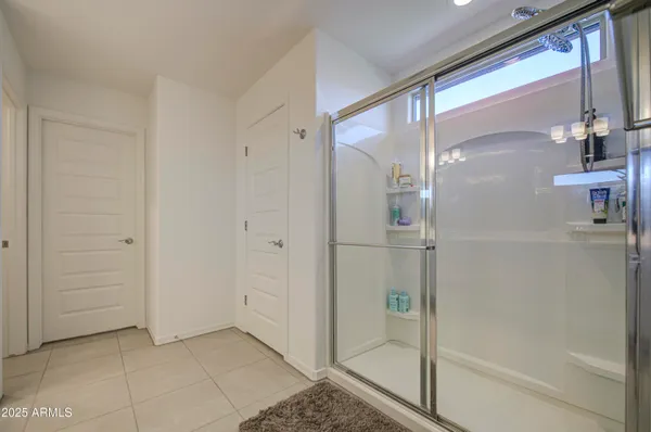 a bathroom with a sink a toilet and view