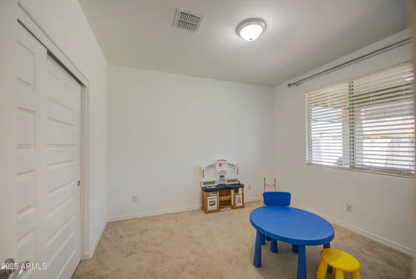 a room with furniture and a window