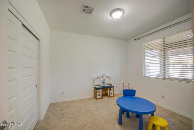 a room with furniture and a window