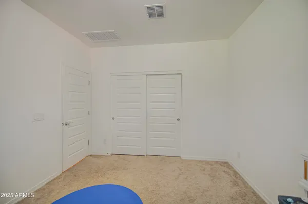 an empty room with closet