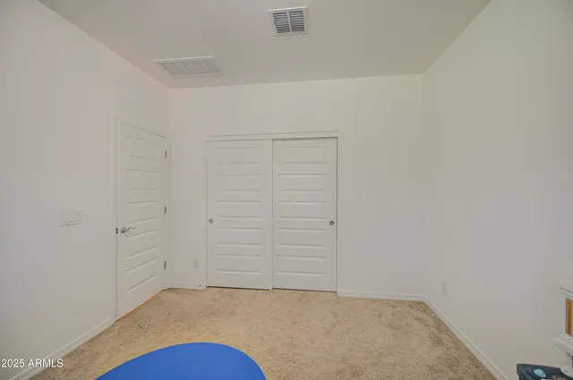 an empty room with closet