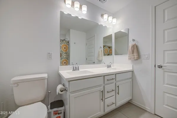 a view of a dining room with furniture wooden floor and a rug