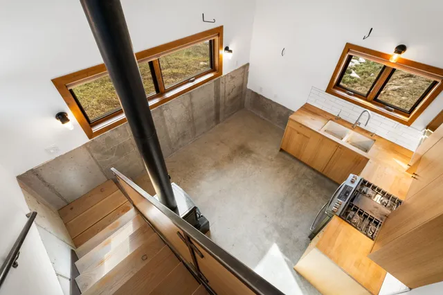 a view of a hallway with washer and dryer